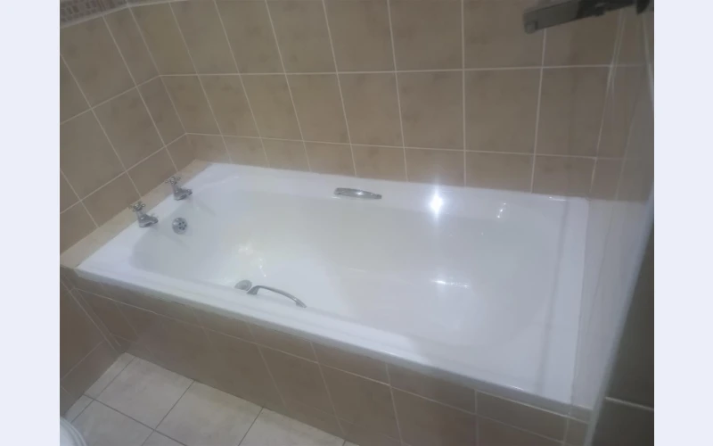 Bath with taps and connections
