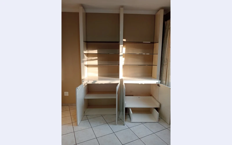 Solid wood display cabinet with 6x 10mil bronze glass.  Collection ONLY in Edenvale.